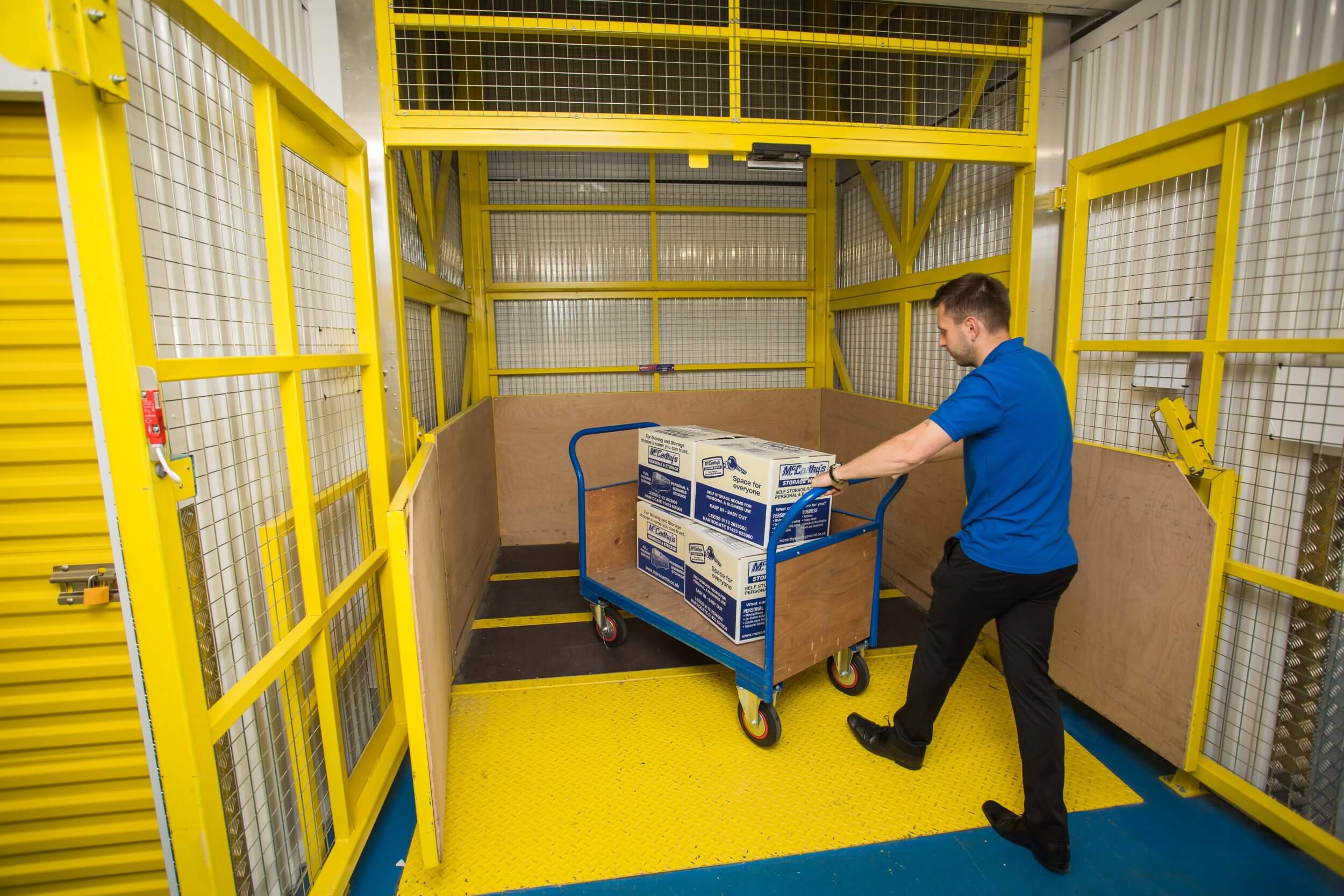 Man loading goods lift