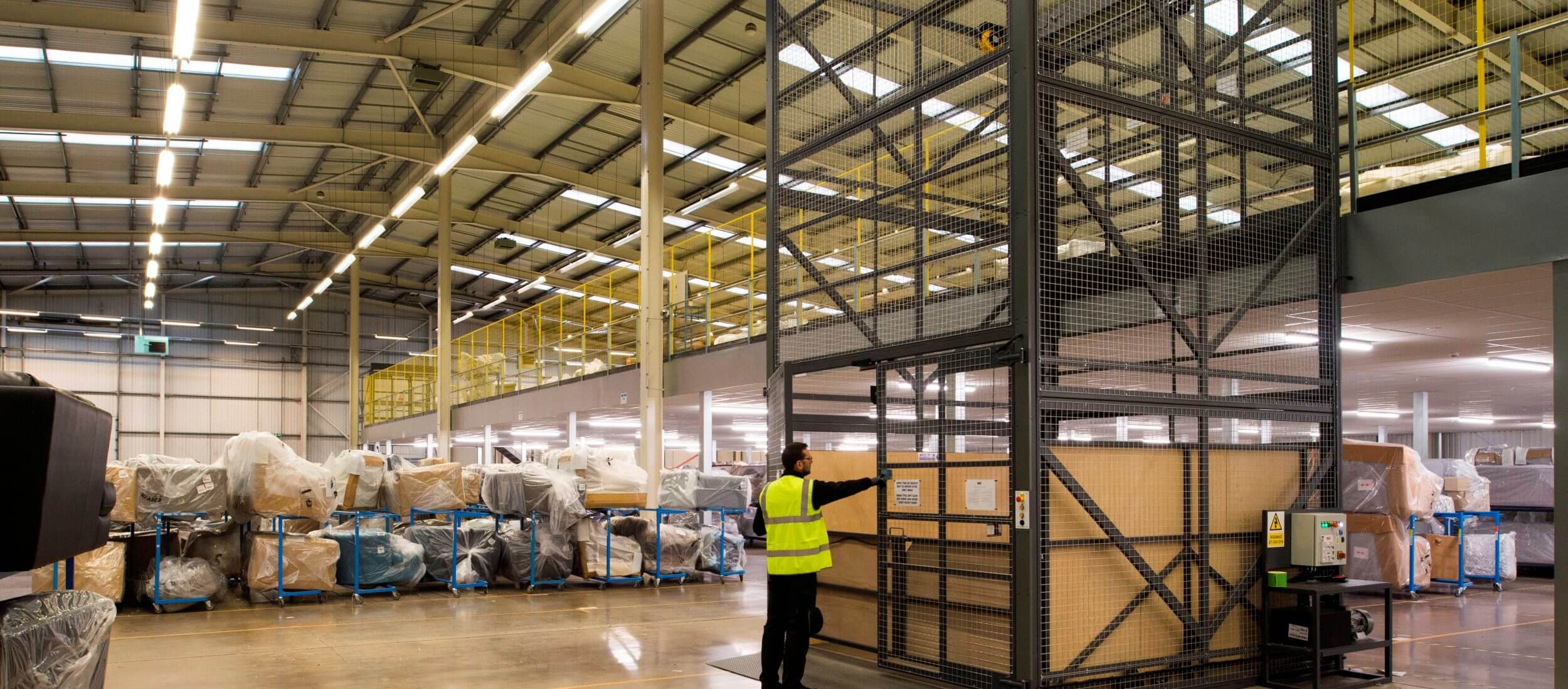 Mezzanine floor lifts in warehouse